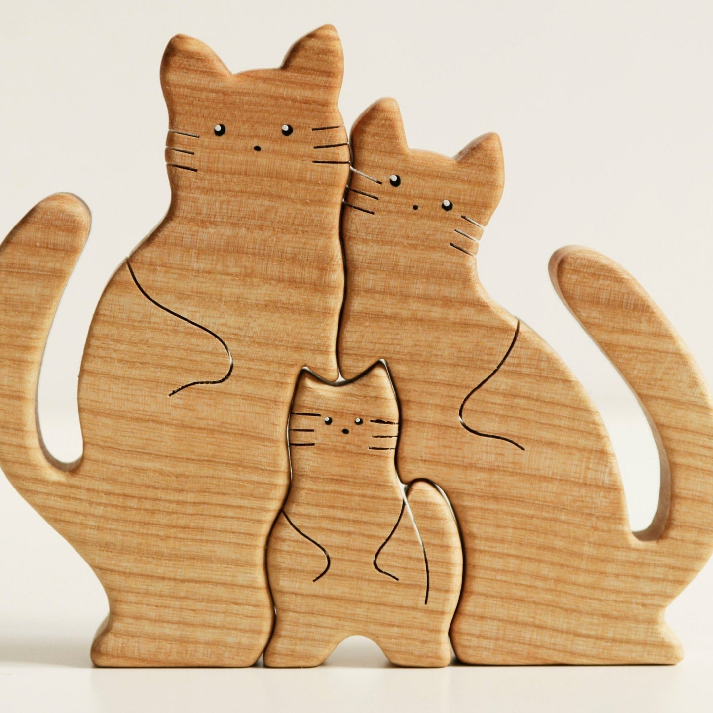 Wooden cat family puzzle