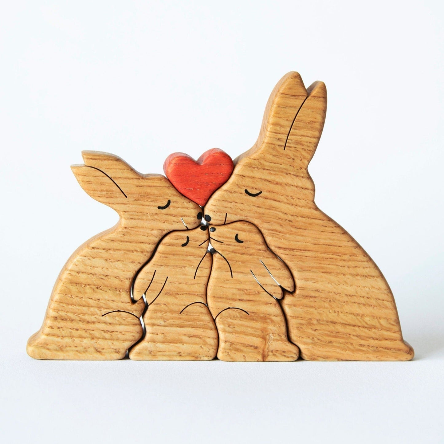 Wooden hare family puzzle