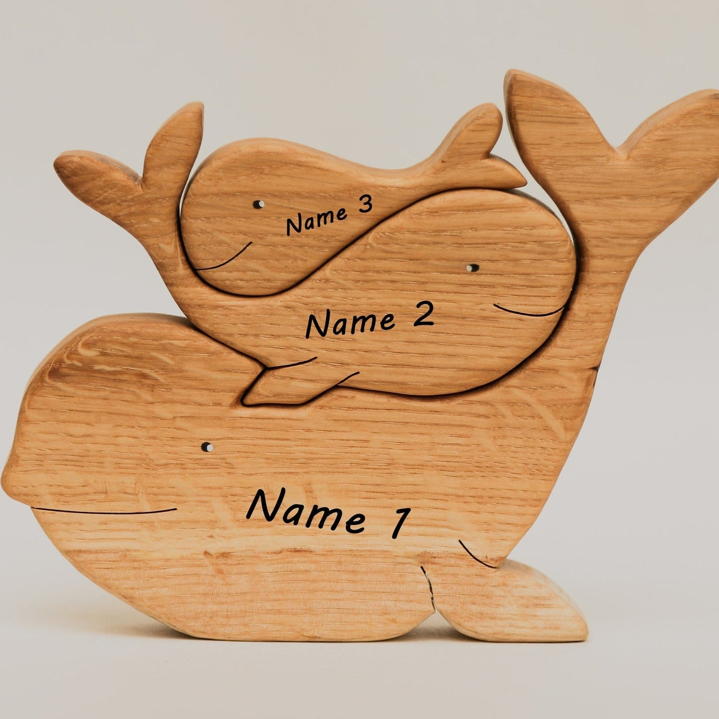 Wooden whales family puzzle